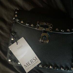 Black Diamond purse brand new with tags